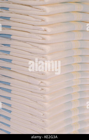 Pile of XXXL diapers. Background of big nappies Stock Photo - Alamy