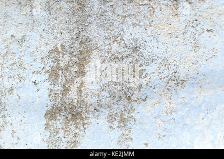 Shabby rural whitewash wall textured background close-up Stock Photo