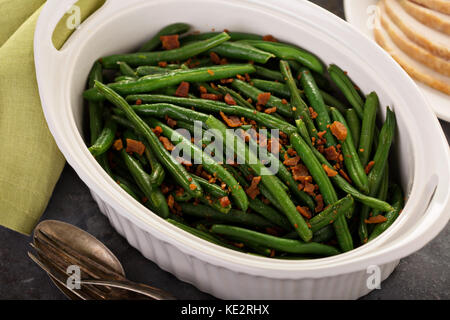 Green beans with bacon, side dish for Thanksgiving or Christmas dinner Stock Photo