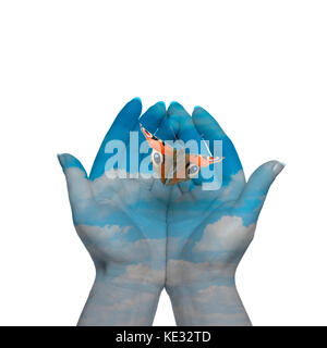 Womans hands letting the butterfly be free to go Stock Photo