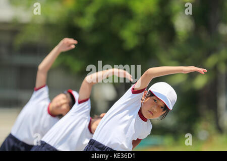 Japanese kids during school sports day Stock Photo