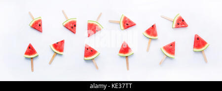 Watermelon slice popsicles on white background Stock Photo