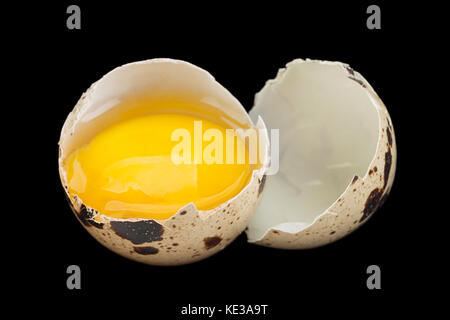 Quail eggs closeup isolated on black background Stock Photo