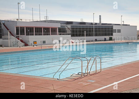 The newly refurbished outdoor swimming pool at Uxbridge Lido and sports centre west of London, UK. Early morning view before opening to the public. Stock Photo