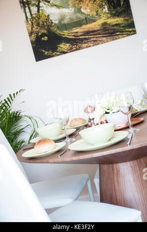 angled view of dining table in kitchen Stock Photo