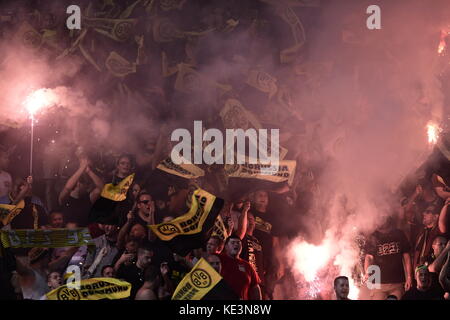 Nicosia, Cyprus. 17th Oct, 2017. Dortmund's fans hold up flares during the Champions League group stages qualification match between APOEL Nicosia and Borussia Dortmund in the GSP Stadium in Nicosia, Cyprus, 17 October 2017. Credit: Angelos Tzortzinis/dpa/Alamy Live News Stock Photo