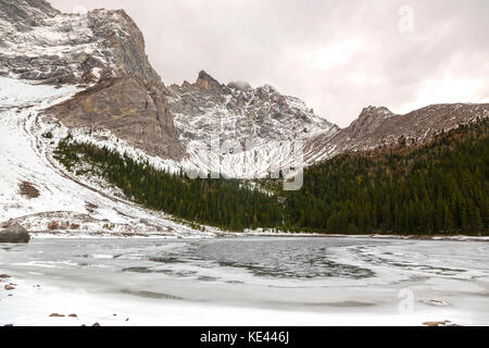 Upper Tombstone Lake and Snowy Kananaskis Country Early Winter Landscape in Alberta Foothills near Banff National Park Canadian Rocky Mountains Stock Photo