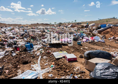 Piles of household refuse in dumping area at local tip Stock Photo