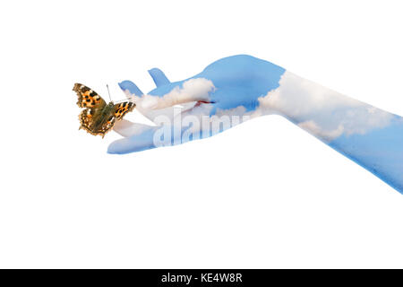 Womans hands letting the butterfly be free to go Stock Photo