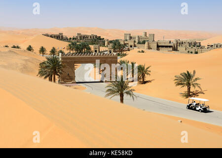 Qasr-al-Sarab Hotel in the sand dunes, Liwa Desert, Abu Dhabi, United Arab Emirates Stock Photo