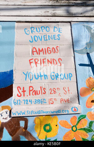Address and location of (youth group) Grupo de Jovenes building painted on the side of their building. Minneapolis Minnesota MN USA Stock Photo
