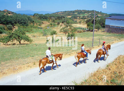 Three people riding horses. Las Medulas, Leon province, Castilla Leon, Spain. Stock Photo