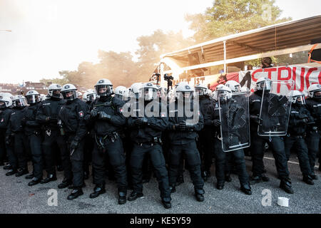 HAMBURG, JULY 6, 2017: Riot policemen during the demonstration against G20 summit in Hamburg, Germany. Stock Photo