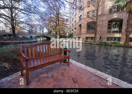 January 3, 2016 San Antonio, Texas: resting bench along the famous river walk in the downtown area Stock Photo