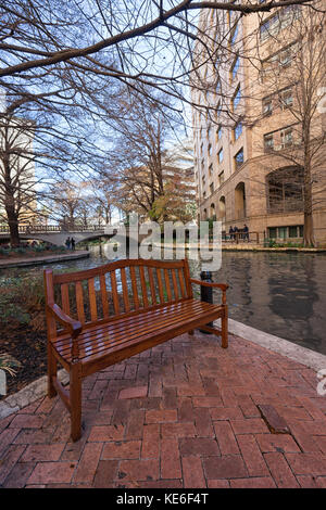January 3, 2016 San Antonio, Texas: resting bench along the famous river walk in the downtown area Stock Photo