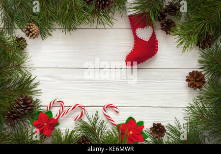 Christmas tree branches on white background as a border or template for  christmas card Stock Photo - Alamy