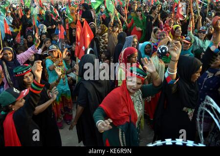 Hyderabad, Pakistan. 18th Oct, 2017. PPP women dance on the beat of there party songs during the large public gathering in Hyderabad in which chairman of Pakistan Peoples Party PPP Bilawal Bhutto will deliver his speech Credit: Janali Laghari/Pacific Press/Alamy Live News Stock Photo
