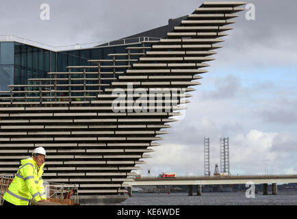 Japanese architect Kengo Kuma views the river facing front of the V&amp;A Museum of Design in Dundee which juts out into the River Tay. Stock Photo