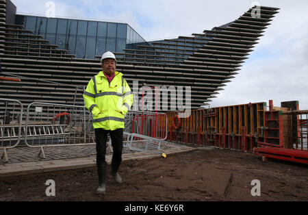 Japanese architect Kengo Kuma views the river facing front of the V&amp;A Museum of Design in Dundee which juts out into the River Tay. Stock Photo