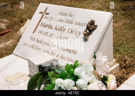The Seychelles, Mahe, Victoria, Mont Fleuri Cemetery, infant mortality, grave of 2 day old child Stock Photo