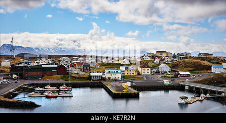 Colourful Houses And Small Boats In A Harbour, Snaefellsnes Peninsula; Iceland Stock Photo