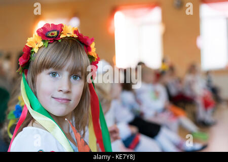 A girl in a traditional Ukrainian flower wreath Stock Photo