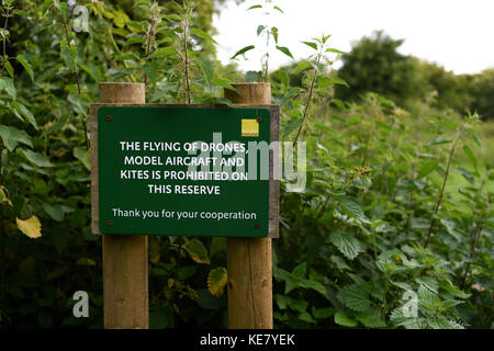 A sign warning that drones and model aircraft are prohibited in this area on the South Downs National Park that runs from Winchester to Eastbourne. Stock Photo