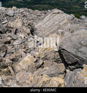 Large rock pieces from the Frank Slide in the Crowsnest Pass, a massive rockslide from Turtle mountain in 1903, burying the town of Frank Stock Photo