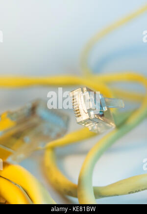 Yellow ethernet cable connector isolated Stock Photo