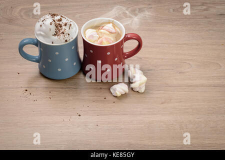 Two cups of coffee drinks as symbol of strong hot sweet relationships Stock Photo