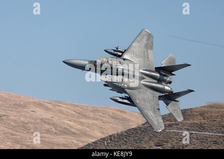 McDonell Douglas F-15 Eagle blasting through the Mach Loop in Eales Stock Photo