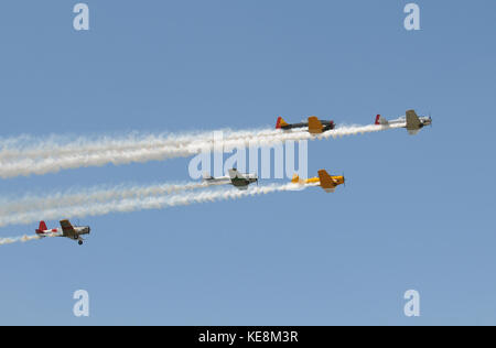 Formation of World War II era airplanes Stock Photo