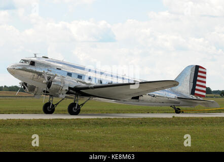 Vintage silver colored turboprop airplane side view Stock Photo - Alamy