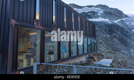 MOIRY VALLEY, SWITZERLAND - Modern addition to Cabane de Moiry, mountain hut, Moiry glacier, in the Pennine Alps in the canton of Valais. Stock Photo