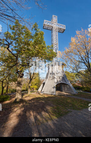 Montreal, Canada - 18 October 2017: Montreal Mont-Royal Cross with fall foliage colours Stock Photo