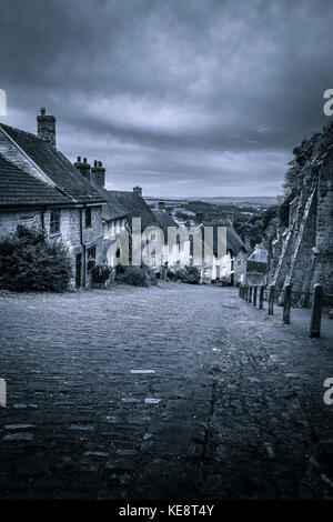 Gold Hill in Shaftesbury Dorset early in the morning looking down the hill Stock Photo