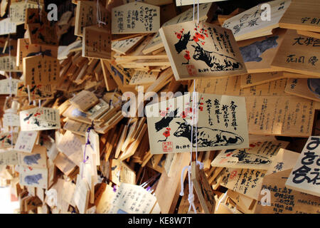 The prayer plaques called 'Ema' in Japan. It contains a wish of people. Pic was  taken in August 2017. Translation: 'Prayers in Japanese' Stock Photo