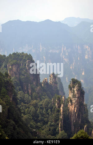 Rock formations around Wulingyuan Scenic Area. What a dramatic landscape! Pic was taken in Zhangjiajie, September 2017. Stock Photo