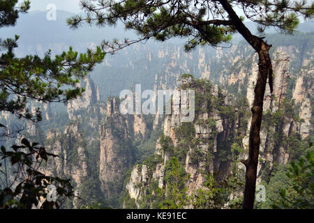 Rock formations around Wulingyuan Scenic Area. What a dramatic landscape! Pic was taken in Zhangjiajie, September 2017. Stock Photo