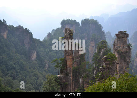 Rock formations around Wulingyuan Scenic Area. What a dramatic landscape! Pic was taken in Zhangjiajie, September 2017. Stock Photo