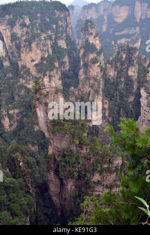 Rock formations around Wulingyuan Scenic Area. What a dramatic landscape! Pic was taken in Zhangjiajie, September 2017. Stock Photo