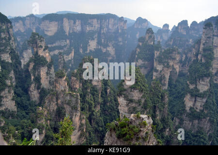 Rock formations around Wulingyuan Scenic Area. What a dramatic landscape! Pic was taken in Zhangjiajie, September 2017. Stock Photo