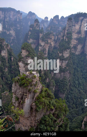 Rock formations around Wulingyuan Scenic Area. What a dramatic landscape! Pic was taken in Zhangjiajie, September 2017. Stock Photo