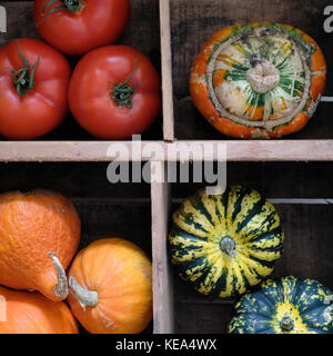 Wooden box with colourful fruit and vegetables. Stock Photo
