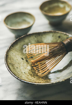 Japanese tools and bowls for brewing matcha tea, selective focus Stock Photo