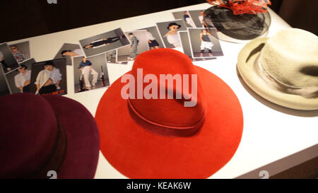 Collection of fashion hats on the table. Collage with different hats. Stock Photo