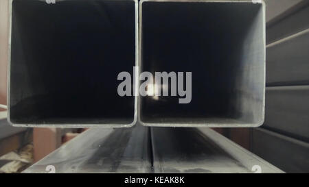Steel tube, square high carbon metal tube background for heavy industry Stock Photo