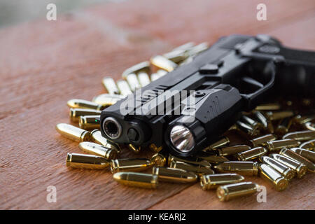 Pistol SigSauer P320 X-Five & flashlight Foxtrot 1 Stock Photo