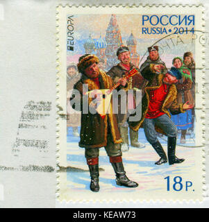GOMEL, BELARUS, 13 OCTOBER 2017, Stamp printed in Russia shows image of the Russian national costume, circa 2014. Stock Photo
