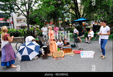 Hare Krishnas singing and dancing in New York's Union Square. Stock Photo